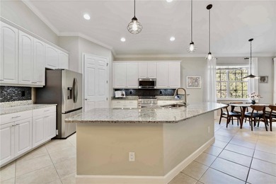 Luxury living meets tranquil natural preserve views in the on Venetian Golf and River Club in Florida - for sale on GolfHomes.com, golf home, golf lot