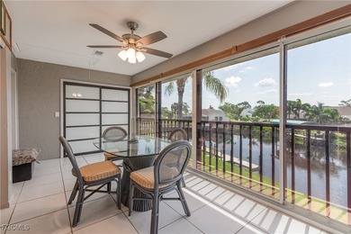 This inviting second-floor waterfront condo is located in the on Riverbend Golf and Country Club in Florida - for sale on GolfHomes.com, golf home, golf lot