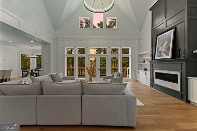 Welcome to this breathtaking four-sided brick estate, perfectly on Whitewater Creek in Georgia - for sale on GolfHomes.com, golf home, golf lot