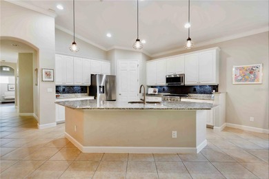 Luxury living meets tranquil natural preserve views in the on Venetian Golf and River Club in Florida - for sale on GolfHomes.com, golf home, golf lot