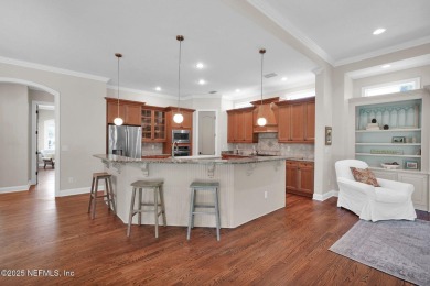 This stunning custom-built home offers an open yet traditional on The Palencia Club in Florida - for sale on GolfHomes.com, golf home, golf lot