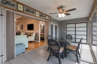 This inviting second-floor waterfront condo is located in the on Riverbend Golf and Country Club in Florida - for sale on GolfHomes.com, golf home, golf lot