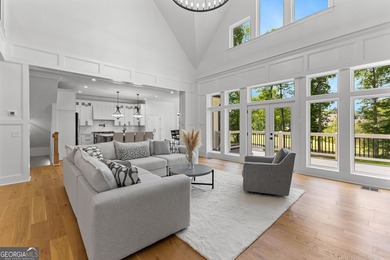 Welcome to this breathtaking four-sided brick estate, perfectly on Whitewater Creek in Georgia - for sale on GolfHomes.com, golf home, golf lot