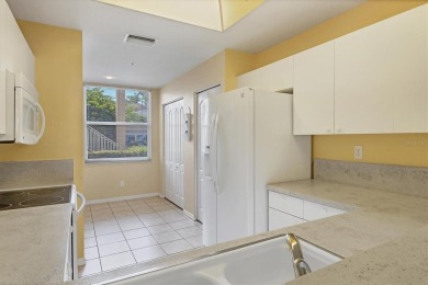 Bright and beautiful, PET friendly first floor end unit condo on Stoneybrook Golf and Country Club of Sarasota in Florida - for sale on GolfHomes.com, golf home, golf lot