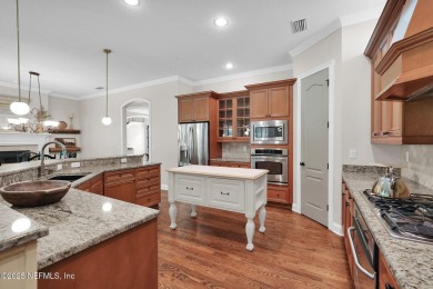 This stunning custom-built home offers an open yet traditional on The Palencia Club in Florida - for sale on GolfHomes.com, golf home, golf lot