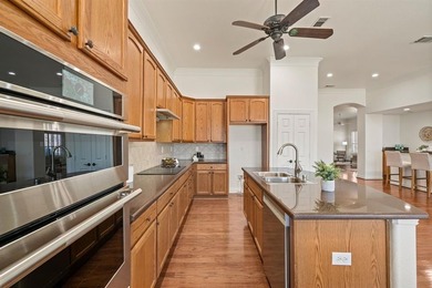 Experience elevated living in this stunning single-story home on Wildhorse Golf Club of Robson Ranch in Texas - for sale on GolfHomes.com, golf home, golf lot