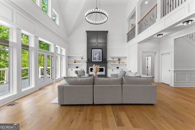 Welcome to this breathtaking four-sided brick estate, perfectly on Whitewater Creek in Georgia - for sale on GolfHomes.com, golf home, golf lot