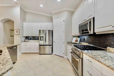 Luxury living meets tranquil natural preserve views in the on Venetian Golf and River Club in Florida - for sale on GolfHomes.com, golf home, golf lot