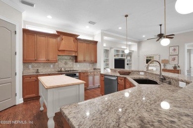 This stunning custom-built home offers an open yet traditional on The Palencia Club in Florida - for sale on GolfHomes.com, golf home, golf lot