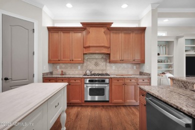 This stunning custom-built home offers an open yet traditional on The Palencia Club in Florida - for sale on GolfHomes.com, golf home, golf lot
