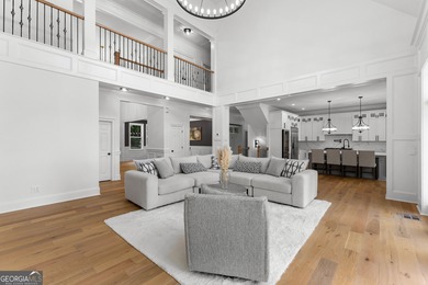 Welcome to this breathtaking four-sided brick estate, perfectly on Whitewater Creek in Georgia - for sale on GolfHomes.com, golf home, golf lot