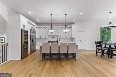 Welcome to this breathtaking four-sided brick estate, perfectly on Whitewater Creek in Georgia - for sale on GolfHomes.com, golf home, golf lot