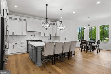 Welcome to this breathtaking four-sided brick estate, perfectly on Whitewater Creek in Georgia - for sale on GolfHomes.com, golf home, golf lot