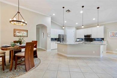 Luxury living meets tranquil natural preserve views in the on Venetian Golf and River Club in Florida - for sale on GolfHomes.com, golf home, golf lot