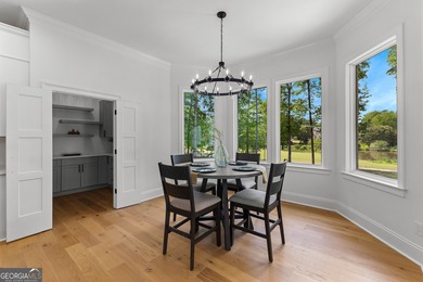 Welcome to this breathtaking four-sided brick estate, perfectly on Whitewater Creek in Georgia - for sale on GolfHomes.com, golf home, golf lot