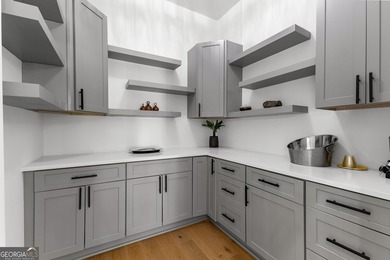 Welcome to this breathtaking four-sided brick estate, perfectly on Whitewater Creek in Georgia - for sale on GolfHomes.com, golf home, golf lot