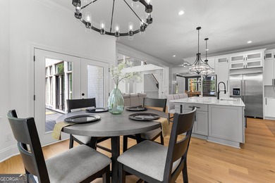 Welcome to this breathtaking four-sided brick estate, perfectly on Whitewater Creek in Georgia - for sale on GolfHomes.com, golf home, golf lot