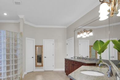 This stunning custom-built home offers an open yet traditional on The Palencia Club in Florida - for sale on GolfHomes.com, golf home, golf lot