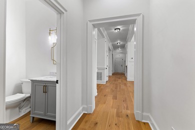 Welcome to this breathtaking four-sided brick estate, perfectly on Whitewater Creek in Georgia - for sale on GolfHomes.com, golf home, golf lot