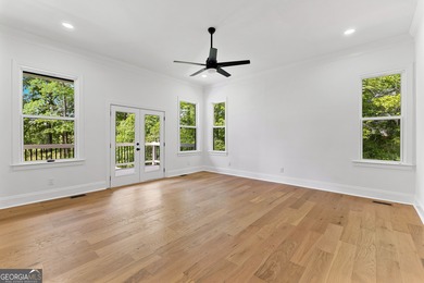 Welcome to this breathtaking four-sided brick estate, perfectly on Whitewater Creek in Georgia - for sale on GolfHomes.com, golf home, golf lot