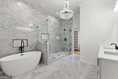 Welcome to this breathtaking four-sided brick estate, perfectly on Whitewater Creek in Georgia - for sale on GolfHomes.com, golf home, golf lot