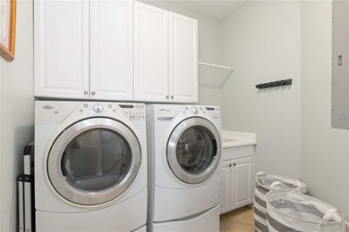 Luxury living meets tranquil natural preserve views in the on Venetian Golf and River Club in Florida - for sale on GolfHomes.com, golf home, golf lot