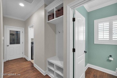 This stunning custom-built home offers an open yet traditional on The Palencia Club in Florida - for sale on GolfHomes.com, golf home, golf lot