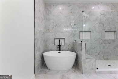 Welcome to this breathtaking four-sided brick estate, perfectly on Whitewater Creek in Georgia - for sale on GolfHomes.com, golf home, golf lot