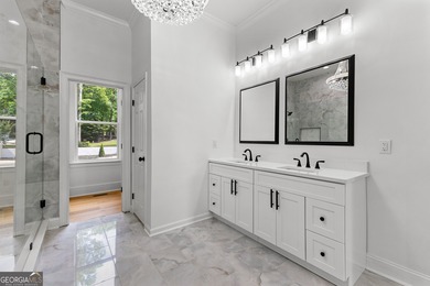 Welcome to this breathtaking four-sided brick estate, perfectly on Whitewater Creek in Georgia - for sale on GolfHomes.com, golf home, golf lot