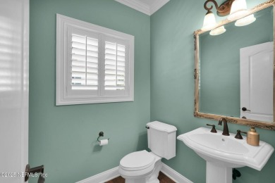 This stunning custom-built home offers an open yet traditional on The Palencia Club in Florida - for sale on GolfHomes.com, golf home, golf lot