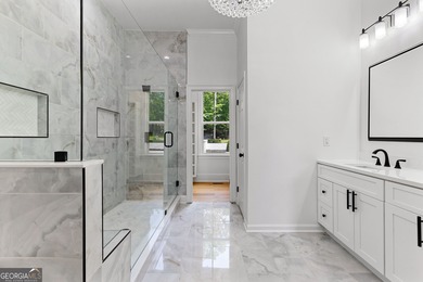 Welcome to this breathtaking four-sided brick estate, perfectly on Whitewater Creek in Georgia - for sale on GolfHomes.com, golf home, golf lot