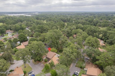 This stunning town home offers true resort-style living--updated on River Bend Golf and Country Club in North Carolina - for sale on GolfHomes.com, golf home, golf lot