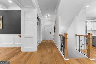 Welcome to this breathtaking four-sided brick estate, perfectly on Whitewater Creek in Georgia - for sale on GolfHomes.com, golf home, golf lot