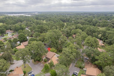 This stunning town home offers true resort-style living-updated on River Bend Golf and Country Club in North Carolina - for sale on GolfHomes.com, golf home, golf lot