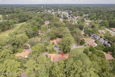 This stunning town home offers true resort-style living-updated on River Bend Golf and Country Club in North Carolina - for sale on GolfHomes.com, golf home, golf lot