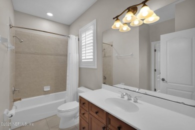 This stunning custom-built home offers an open yet traditional on The Palencia Club in Florida - for sale on GolfHomes.com, golf home, golf lot