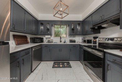 This stunning town home offers true resort-style living--updated on River Bend Golf and Country Club in North Carolina - for sale on GolfHomes.com, golf home, golf lot