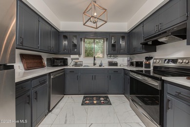 This stunning town home offers true resort-style living-updated on River Bend Golf and Country Club in North Carolina - for sale on GolfHomes.com, golf home, golf lot