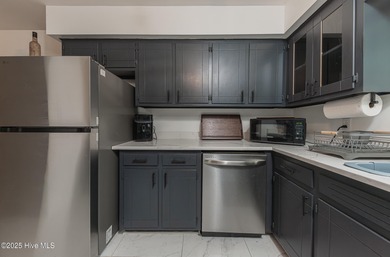 This stunning town home offers true resort-style living-updated on River Bend Golf and Country Club in North Carolina - for sale on GolfHomes.com, golf home, golf lot