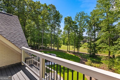 Welcome to this breathtaking four-sided brick estate, perfectly on Whitewater Creek in Georgia - for sale on GolfHomes.com, golf home, golf lot