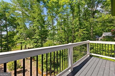 Welcome to this breathtaking four-sided brick estate, perfectly on Whitewater Creek in Georgia - for sale on GolfHomes.com, golf home, golf lot