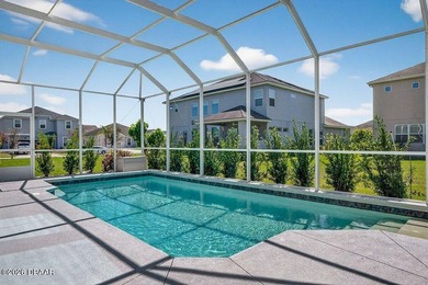 Welcome to this exceptional pool home, perfectly situated on a on The Golf Club At Cypress Head in Florida - for sale on GolfHomes.com, golf home, golf lot