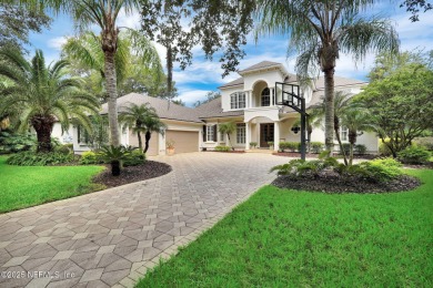 This stunning custom-built home offers an open yet traditional on The Palencia Club in Florida - for sale on GolfHomes.com, golf home, golf lot