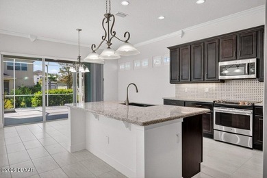 Welcome to this exceptional pool home, perfectly situated on a on The Golf Club At Cypress Head in Florida - for sale on GolfHomes.com, golf home, golf lot