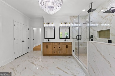 Welcome to this breathtaking four-sided brick estate, perfectly on Whitewater Creek in Georgia - for sale on GolfHomes.com, golf home, golf lot