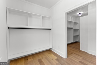 Welcome to this breathtaking four-sided brick estate, perfectly on Whitewater Creek in Georgia - for sale on GolfHomes.com, golf home, golf lot