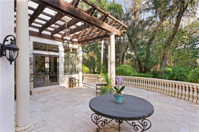 This stunning Mediterranean home is well located overlooking the on Sea Island Golf Club in Georgia - for sale on GolfHomes.com, golf home, golf lot