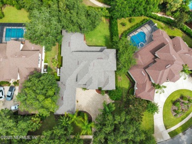 This stunning custom-built home offers an open yet traditional on The Palencia Club in Florida - for sale on GolfHomes.com, golf home, golf lot