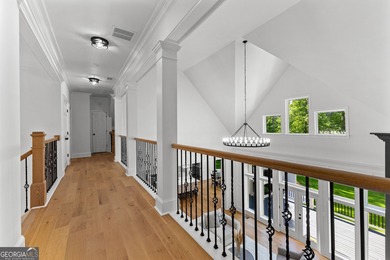 Welcome to this breathtaking four-sided brick estate, perfectly on Whitewater Creek in Georgia - for sale on GolfHomes.com, golf home, golf lot