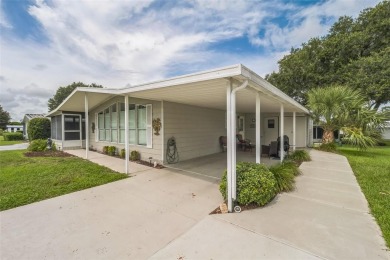 This 2-bedroom, 2-bathroom manufactured home in The Villages on Stonecrest Golf and Club Club in Florida - for sale on GolfHomes.com, golf home, golf lot